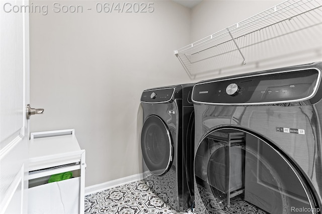 1675 Addison Cir, Walled Lake, MI 48390 - laundry room with baseboards, independent washer and dryer, and tile patterned floors
