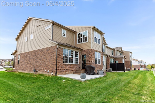 1675 Addison Cir, Walled Lake, MI 48390 - rear view of house with brick siding, a patio area, a lawn, and cooling unit