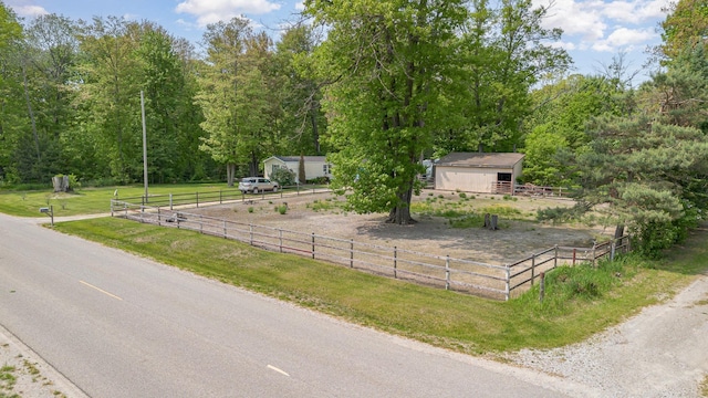 8836 Ora Lake Rd, Hale, MI 48739 - view of asphalt street featuring a wooded view