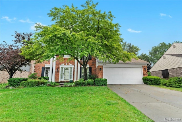 7672 Admiralty Dr, Canton, MI 48187 - view of property hidden behind natural elements with brick siding, driveway, a front yard, and an attached garage