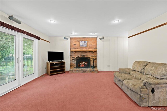 7672 Admiralty Dr, Canton, MI 48187 - living room featuring carpet, a brick fireplace, and recessed lighting