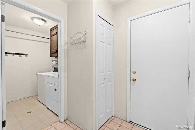 7672 Admiralty Dr, Canton, MI 48187 - washroom featuring cabinet space and light tile patterned floors