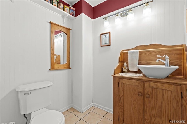 7672 Admiralty Dr, Canton, MI 48187 - bathroom with toilet, vanity, and tile patterned floors
