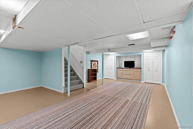 7672 Admiralty Dr, Canton, MI 48187 - finished basement featuring baseboards, stairs, and a drop ceiling