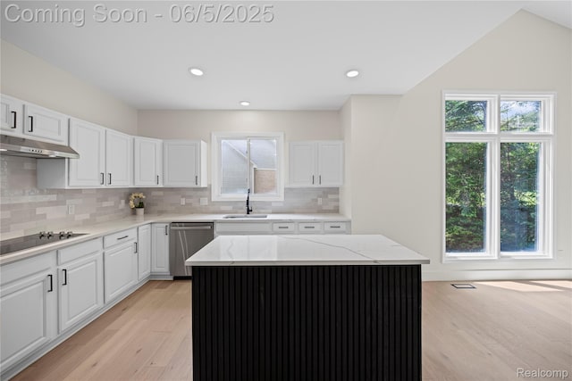 4610 Woodbine Cir W, Bloomfield, MI 48323 - kitchen with dishwasher, a sink, under cabinet range hood, black electric stovetop, and light wood finished floors