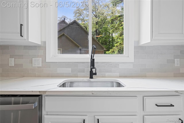 4610 Woodbine Cir W, Bloomfield, MI 48323 - kitchen featuring a sink, dishwasher, white cabinets, light stone countertops, and backsplash