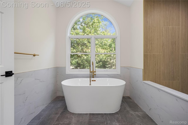 4610 Woodbine Cir W, Bloomfield, MI 48323 - full bath with tile walls, a wainscoted wall, a freestanding bath, and marble finish floors