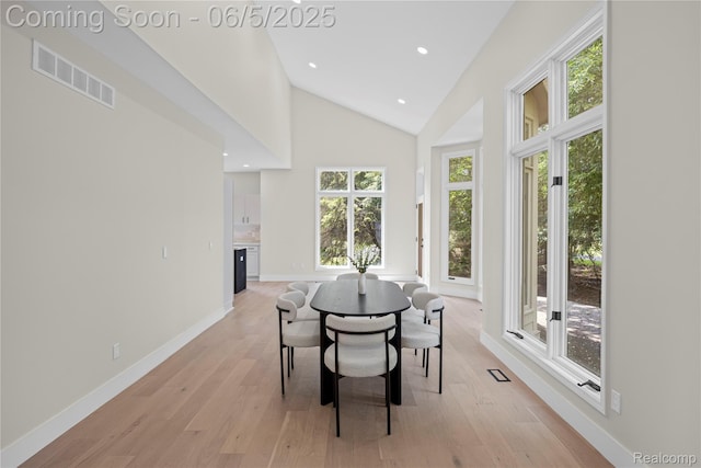 4610 Woodbine Cir W, Bloomfield, MI 48323 - dining area with healthy amount of natural light, light wood finished floors, baseboards, high vaulted ceiling, and recessed lighting
