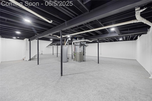 4610 Woodbine Cir W, Bloomfield, MI 48323 - finished basement featuring gas water heater, heating unit, and stairs