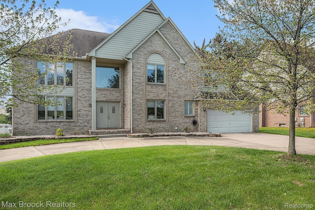 6011 Maple Frst, West Bloomfield, MI 48322 - traditional home with driveway, brick siding, and a front yard