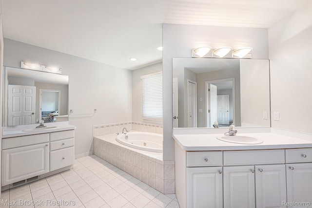 6011 Maple Frst, West Bloomfield, MI 48322 - bathroom featuring tile patterned flooring, a tub with jets, and two vanities