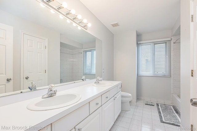 6011 Maple Frst, West Bloomfield, MI 48322 - full bath featuring double vanity, toilet, tile patterned floors, bathing tub / shower combination, and baseboards