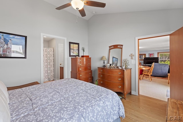 8400 Horton Beach Dr, Manitou Beach, MI 49253 - bedroom with light wood finished floors, baseboards, high vaulted ceiling, and a ceiling fan