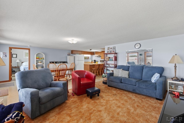8400 Horton Beach Dr, Manitou Beach, MI 49253 - living room featuring light colored carpet and a textured ceiling
