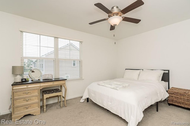 4661 Bradley Cir, Troy, MI 48085 - bedroom featuring light colored carpet, baseboards, and a ceiling fan