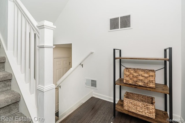 4661 Bradley Cir, Troy, MI 48085 - stairs featuring wood finished floors and baseboards