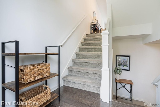 4661 Bradley Cir, Troy, MI 48085 - staircase featuring wood finished floors and baseboards