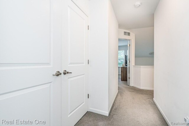 4661 Bradley Cir, Troy, MI 48085 - hallway featuring carpet and baseboards
