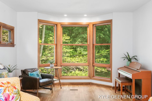 2229 Brighton St, Holland, MI 49424 - sitting room with plenty of natural light, wood finished floors, and recessed lighting