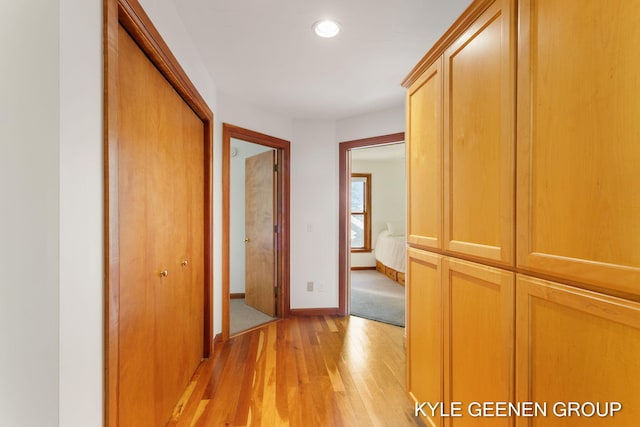 2229 Brighton St, Holland, MI 49424 - hall featuring light wood-style flooring, baseboards, and recessed lighting