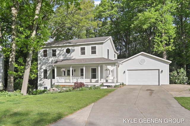 2229 Brighton St, Holland, MI 49424 - view of front of property with a porch, driveway, a garage, and a front lawn