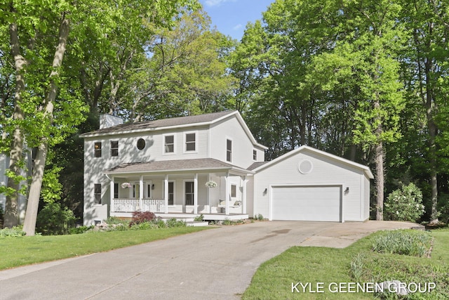 2229 Brighton St, Holland, MI 49424 - view of front facade featuring covered porch, an attached garage, concrete driveway, a chimney, and a front lawn