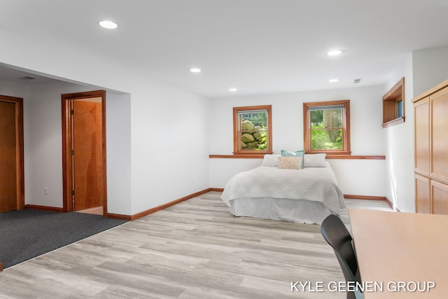 2229 Brighton St, Holland, MI 49424 - bedroom featuring recessed lighting, baseboards, and light wood-style flooring