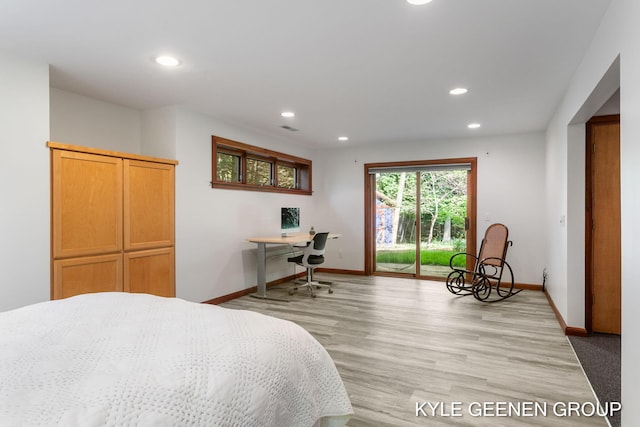 2229 Brighton St, Holland, MI 49424 - bedroom with access to exterior, recessed lighting, baseboards, light wood-style flooring, and a desk