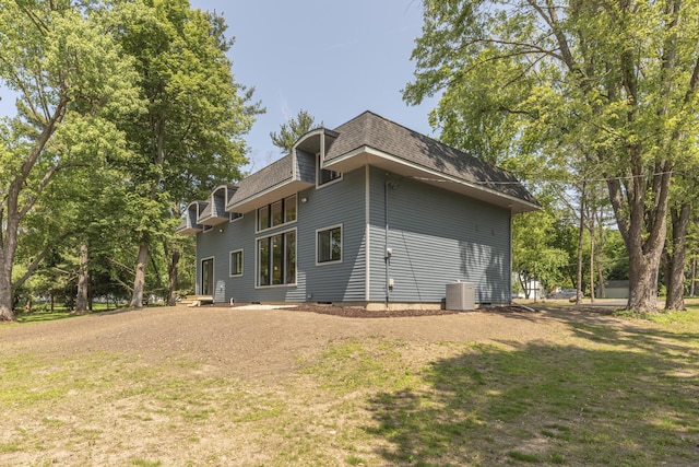 2971 Daleview Dr, Ann Arbor, MI 48105 - back of property with a balcony, a shingled roof, a yard, mansard roof, and central AC