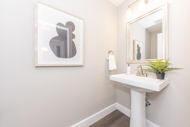 2971 Daleview Dr, Ann Arbor, MI 48105 - bathroom featuring baseboards and wood finished floors