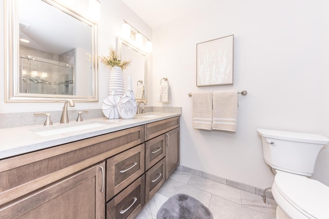 2971 Daleview Dr, Ann Arbor, MI 48105 - full bath featuring toilet, double vanity, baseboards, tile patterned floors, and a shower with door