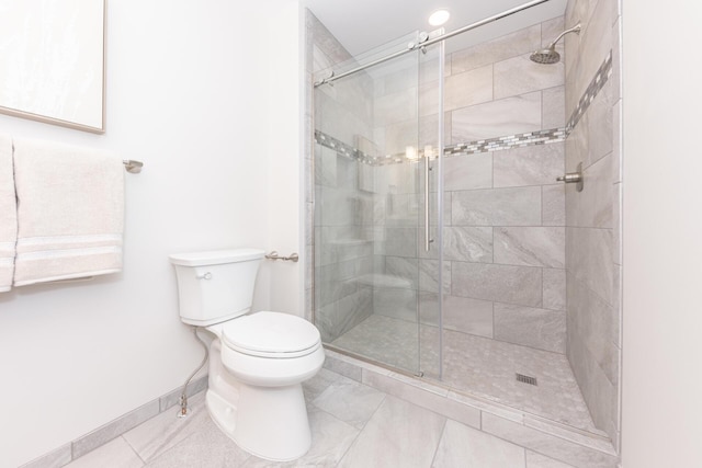 2971 Daleview Dr, Ann Arbor, MI 48105 - bathroom with toilet, a stall shower, baseboards, and tile patterned floors