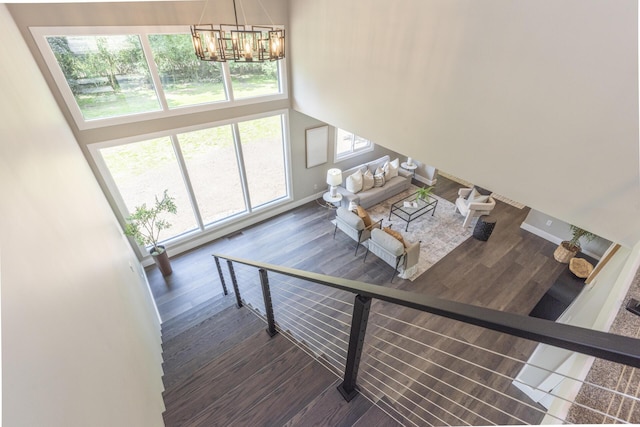 2971 Daleview Dr, Ann Arbor, MI 48105 - living room featuring a chandelier, wood finished floors, and baseboards
