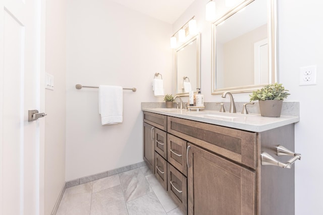 2971 Daleview Dr, Ann Arbor, MI 48105 - full bathroom with double vanity and baseboards
