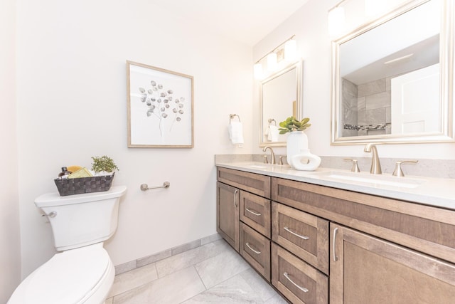 2971 Daleview Dr, Ann Arbor, MI 48105 - full bath featuring double vanity, toilet, and baseboards