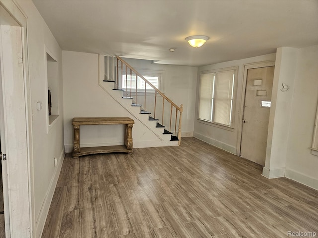 48 W Charlotte St, Ecorse, MI 48229 - foyer featuring stairs, wood finished floors, and baseboards