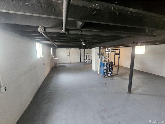 48 W Charlotte St, Ecorse, MI 48229 - below grade area with a heating unit and a sink
