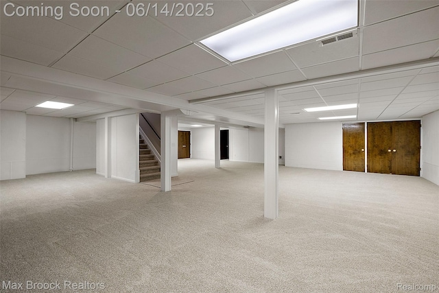 3546 Bloomfield Club Dr, Bloomfield Hills, MI 48301 - finished basement with stairs, carpet floors, and a paneled ceiling