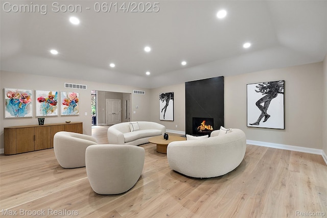 3546 Bloomfield Club Dr, Bloomfield Hills, MI 48301 - living area with light wood finished floors, baseboards, a fireplace, and recessed lighting