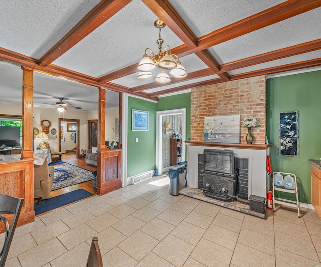 405 E Saginaw St, Saint Louis, MI 48880 - living area with a textured ceiling, coffered ceiling, a chandelier, tile patterned flooring, and baseboards