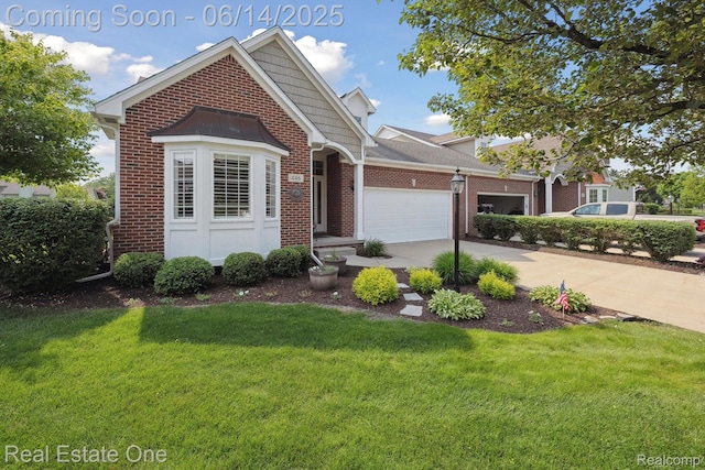 446 Delmar Ct, Highland, MI 48357 - view of front of property with brick siding, an attached garage, a front lawn, and driveway