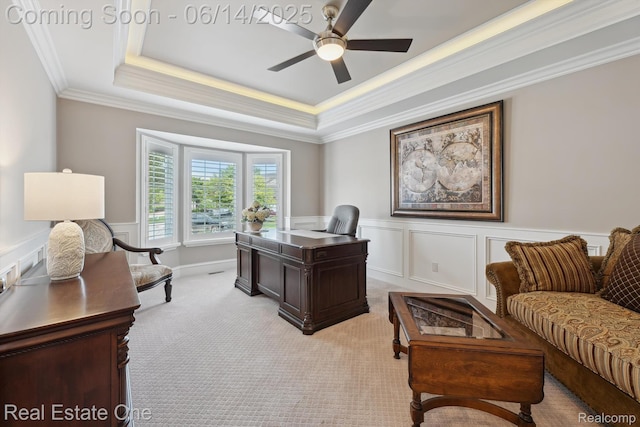 446 Delmar Ct, Highland, MI 48357 - office space with a tray ceiling, crown molding, ceiling fan, light carpet, and a wainscoted wall
