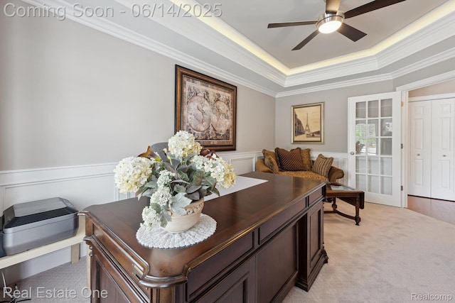 446 Delmar Ct, Highland, MI 48357 - office space featuring a ceiling fan, crown molding, a tray ceiling, light carpet, and wainscoting