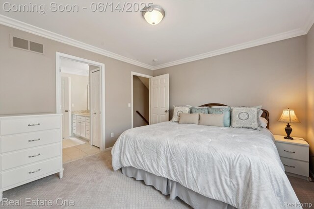 446 Delmar Ct, Highland, MI 48357 - bedroom with ornamental molding, light carpet, and ensuite bathroom