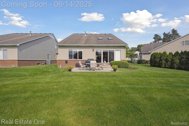 446 Delmar Ct, Highland, MI 48357 - rear view of house featuring a patio, a lawn, and brick siding
