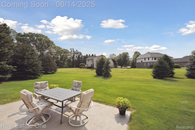 446 Delmar Ct, Highland, MI 48357 - view of patio / terrace featuring outdoor dining space