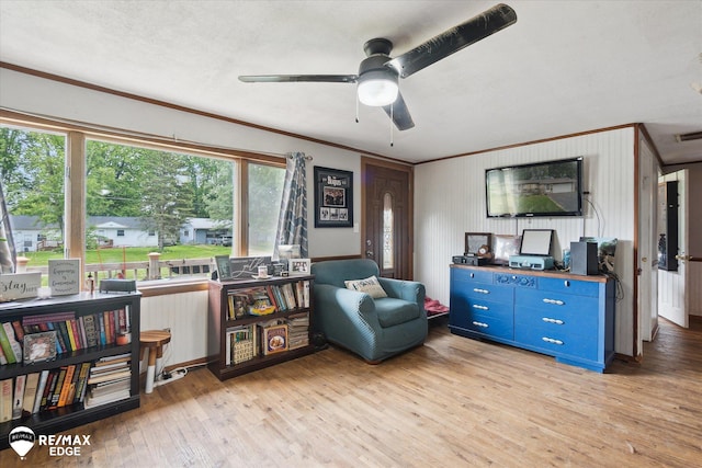 7131 Houghton Dr, Davison, MI 48423 - sitting room featuring light wood finished floors, ornamental molding, and ceiling fan