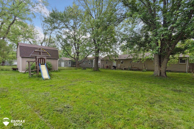 7131 Houghton Dr, Davison, MI 48423 - view of yard featuring a playground