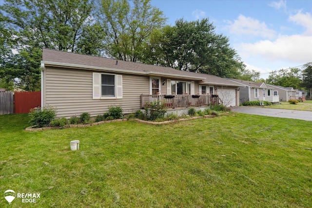 7131 Houghton Dr, Davison, MI 48423 - ranch-style house with asphalt driveway and a garage