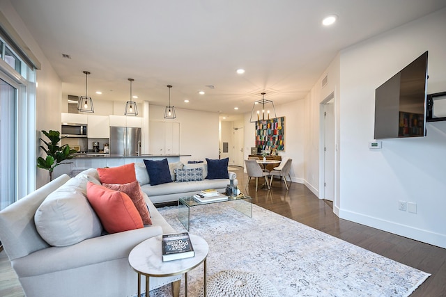 218 W Kingsley St Unit 507, Ann Arbor, MI 48103 - living area with dark wood-style floors, a chandelier, recessed lighting, and baseboards